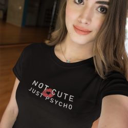 beautiful woman taking a selfie while wearing a not cute just psycho t-shirt