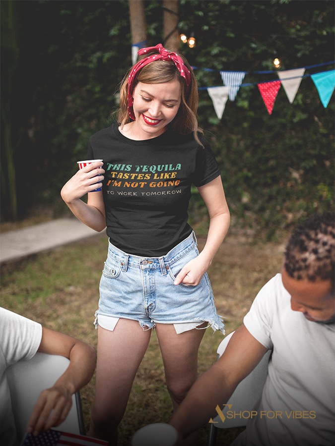 Trending good vibes - Tips to killing a hangover - smiling blonde girl and her friend wearing a tequila t-shirt and drinking on 4th of july bbq party