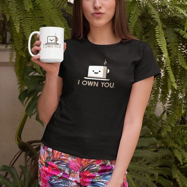 young girl wearing I own you coffee mug and tshirt