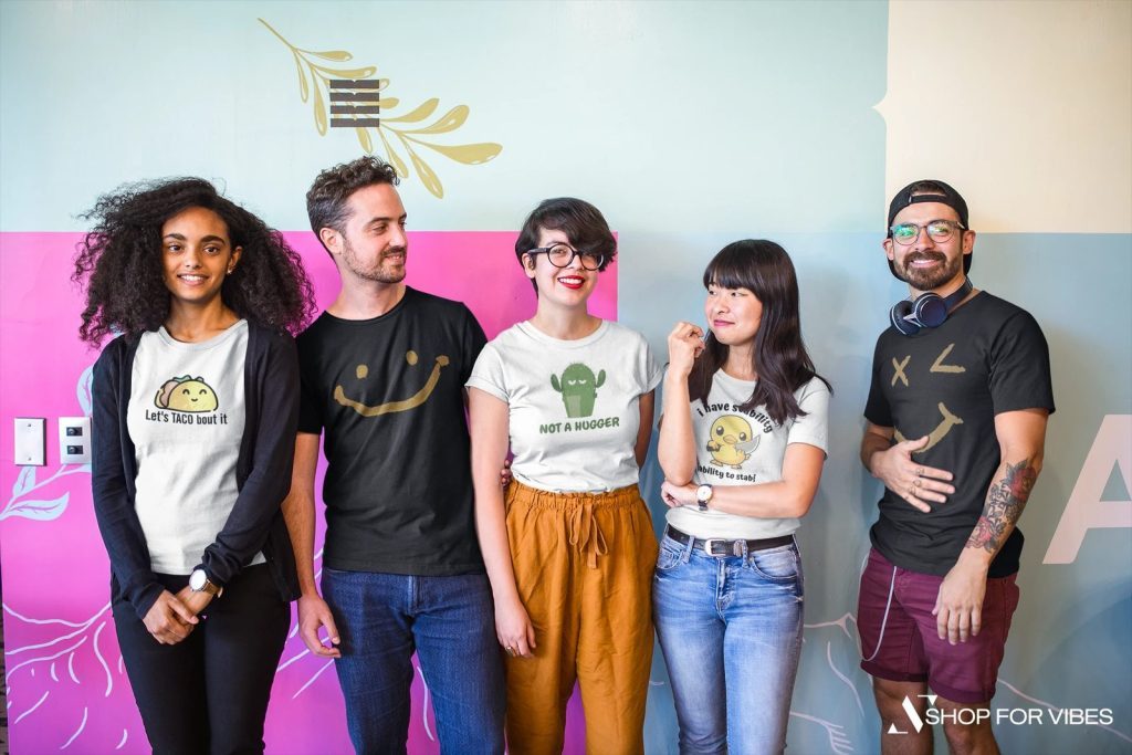 Group of friends wearing Taco, Not a Hugger cactus and smiley funny tees